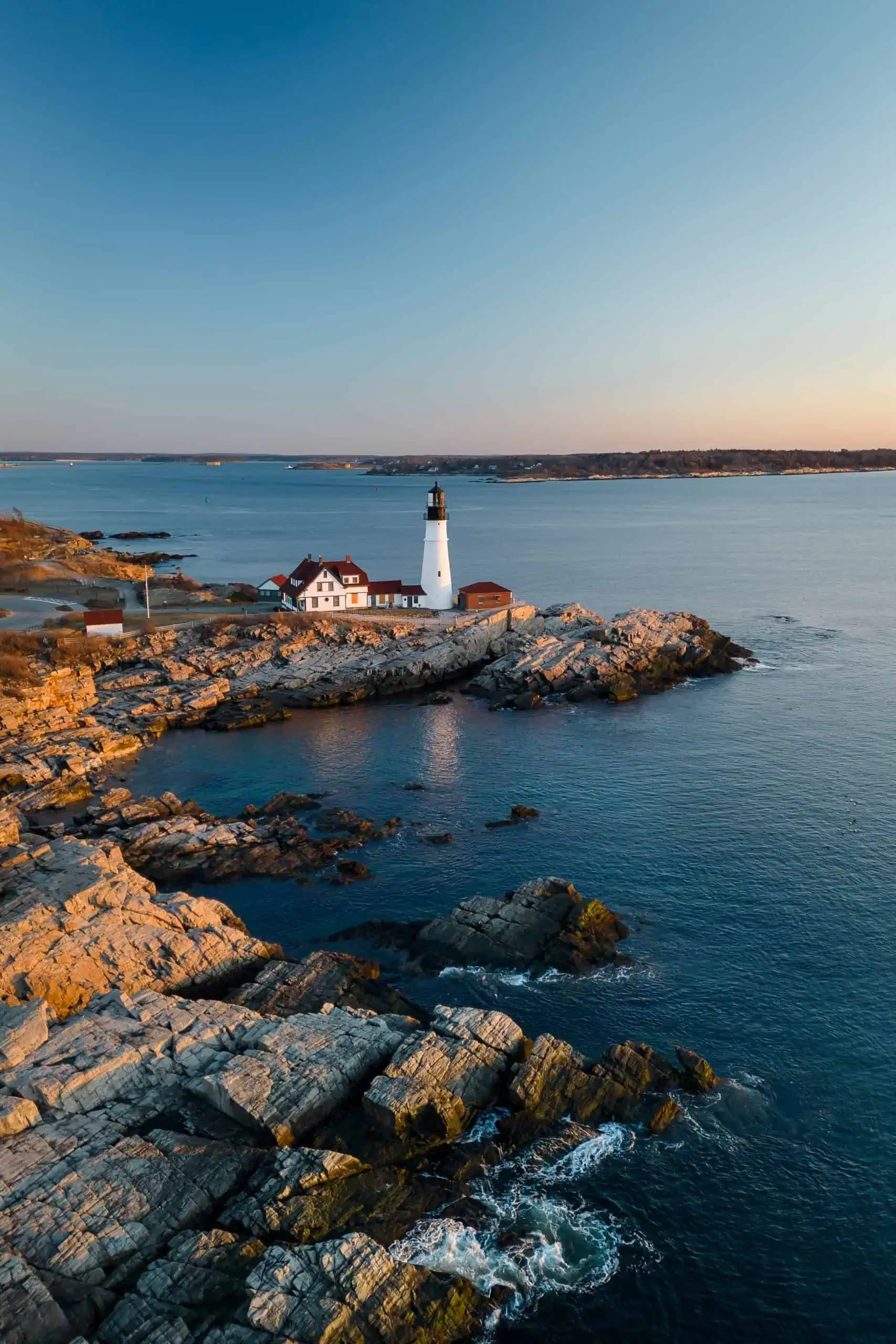 Maine lighthouse at golden hour — a safe place to call home